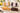 Gluten free lemon coconut cake and chocolate coconut cake, packaged and sliced on marble, grain free, dairy free, refined sugar free, sincerely, BY PARYANI